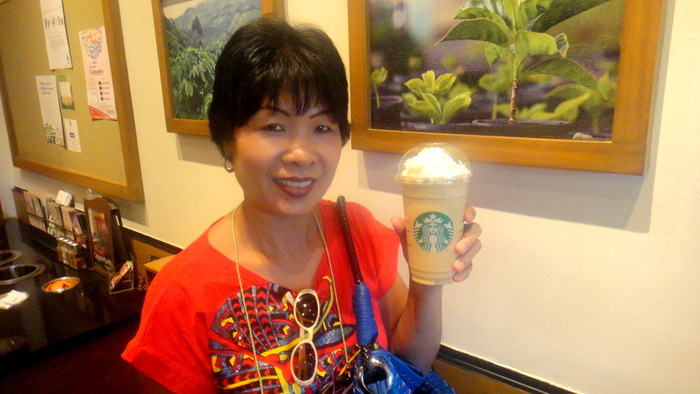 my asawa enjoying a coffee at starbucks at the district northpoint