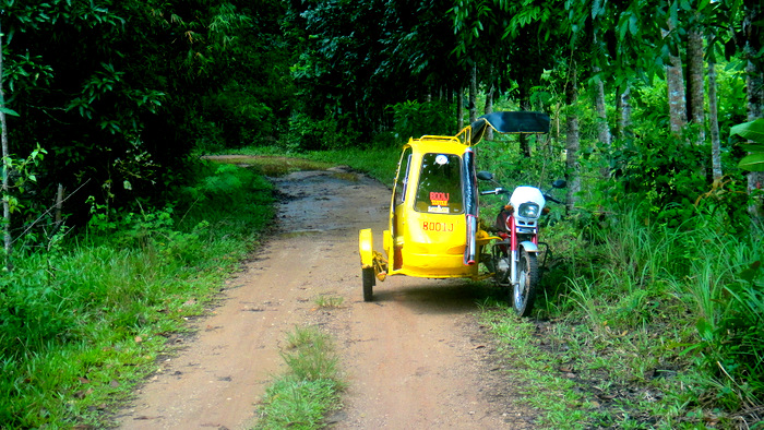 trike driver NoNo waits for us