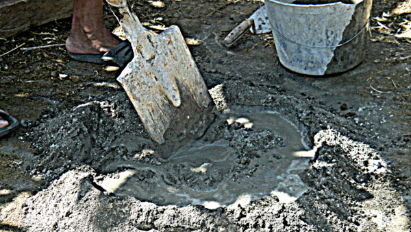 mixing concrete for the nipa hut