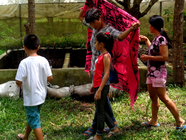 our guide shows us around wonder farms, guimaras