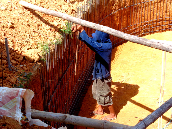 one of our workers, our new pool in the philippines