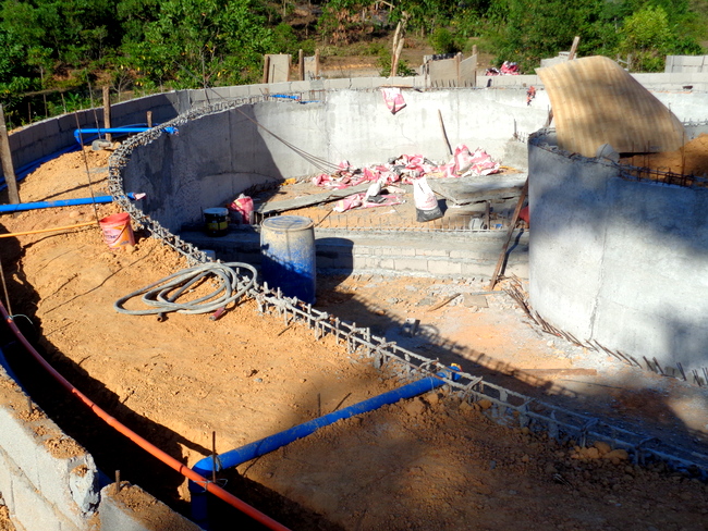 a drainage area surrounds our new pool in the philippines