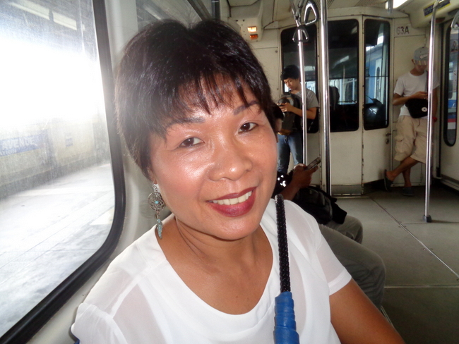 my lovely asawa riding the mrt