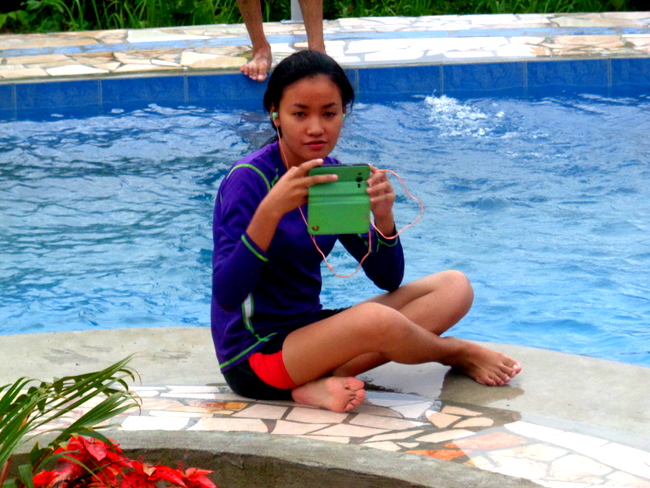 niece denden taking pics in the new pool
